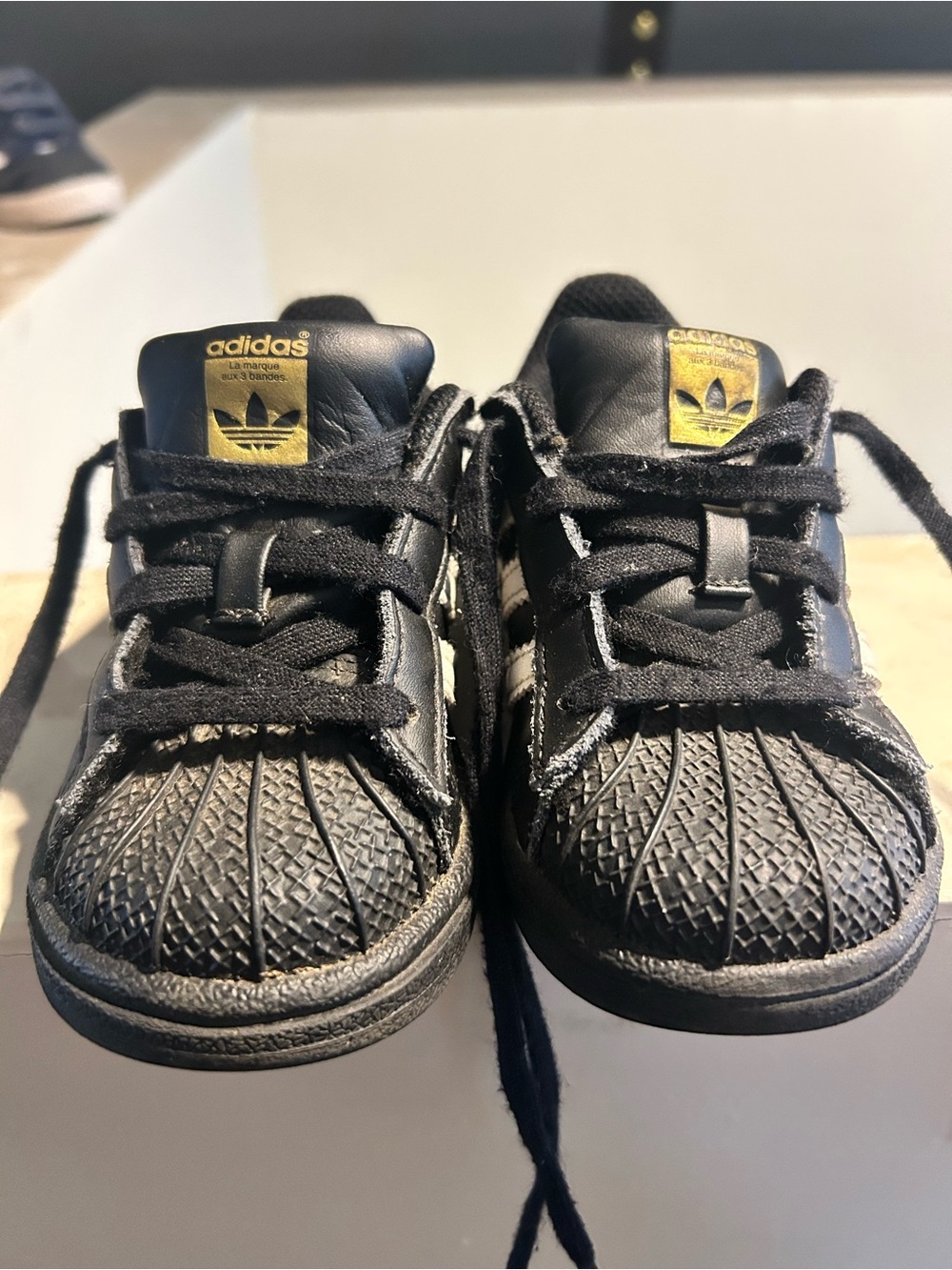 adidas Kids Black Sneakers with Gold Logo Accent